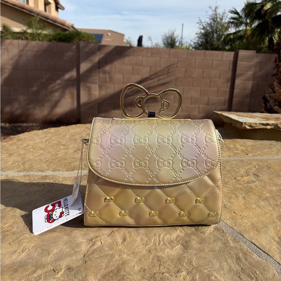 Sanrio Handbags - NWT 50th Anniversary Hello Kitty Gold Quilted Women's Bag